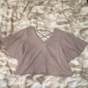 Flowy blouse with criss cross back detail